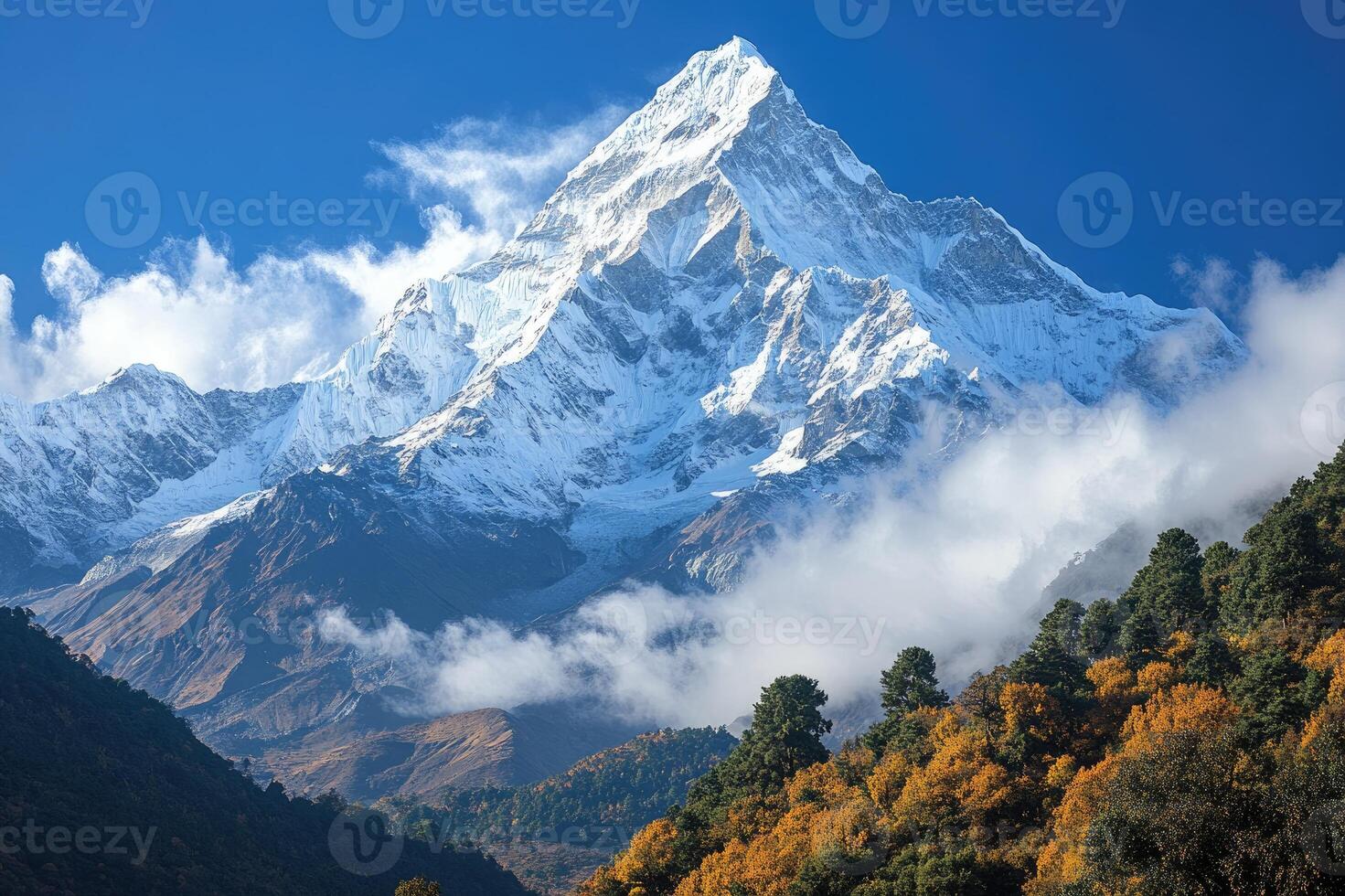 Ama dablam dominating the landscape with colorful autumn trees in the himalayas photo