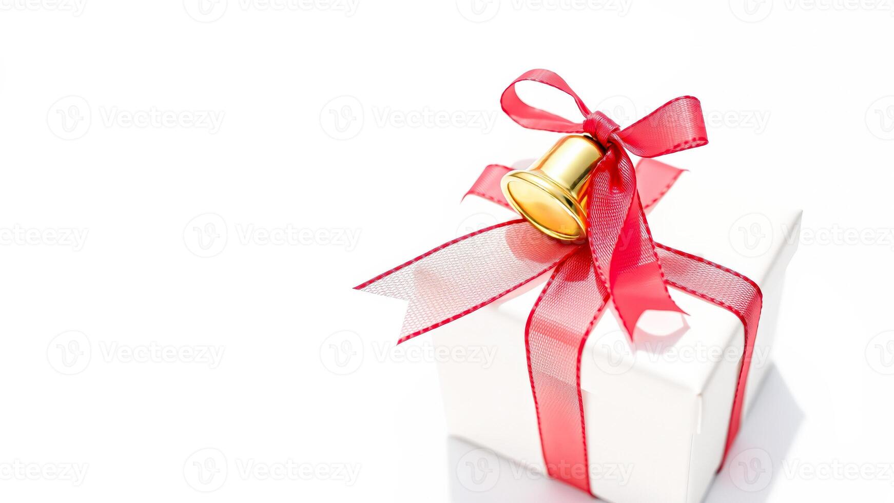 White Gift Box With Red Ribbon And Gold Bell photo