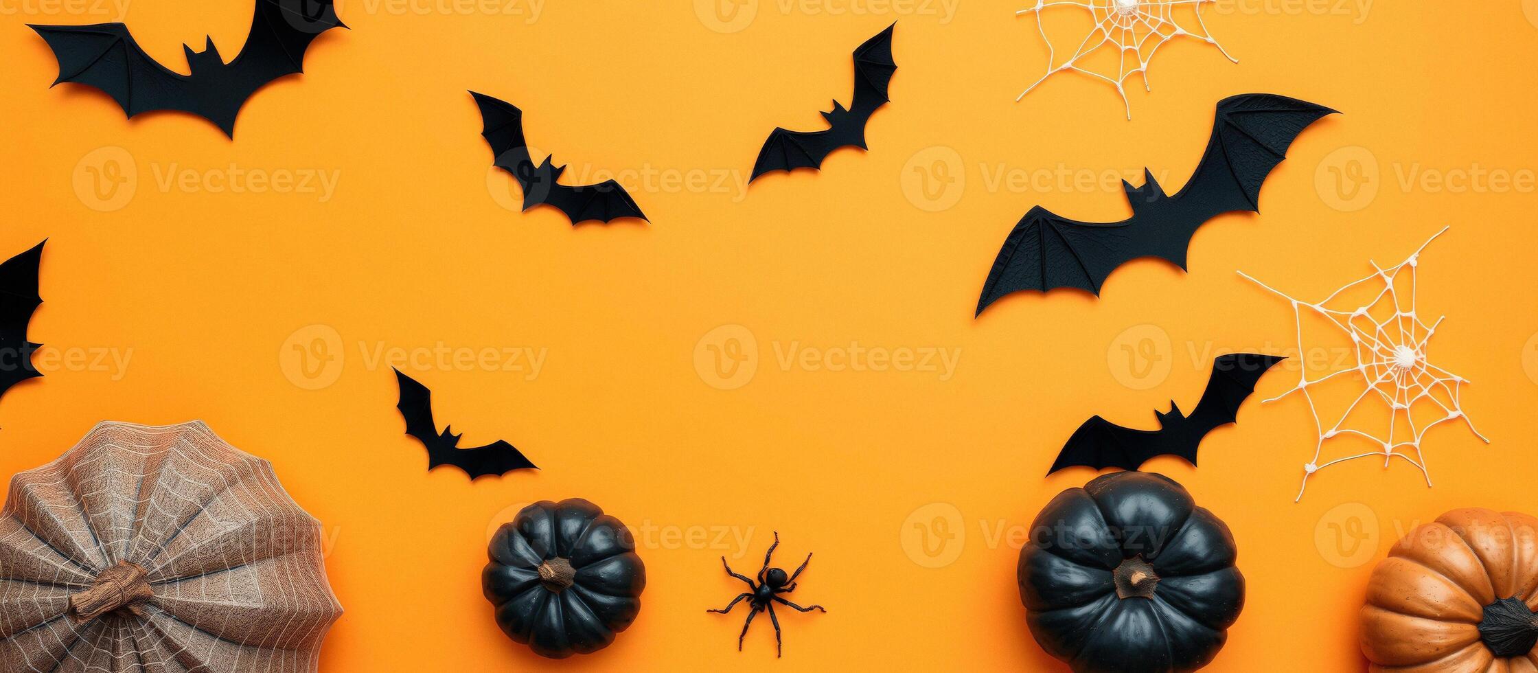 Halloween Decorations on Orange Background photo