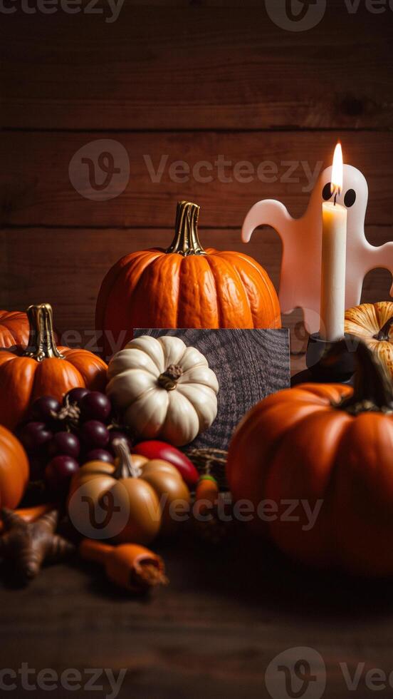 Pumpkin and Ghost Halloween Still Life with Candle photo