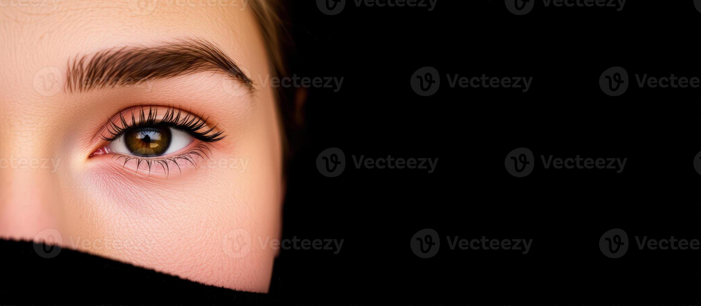 Close Up of Woman's Eye with Dark Background photo