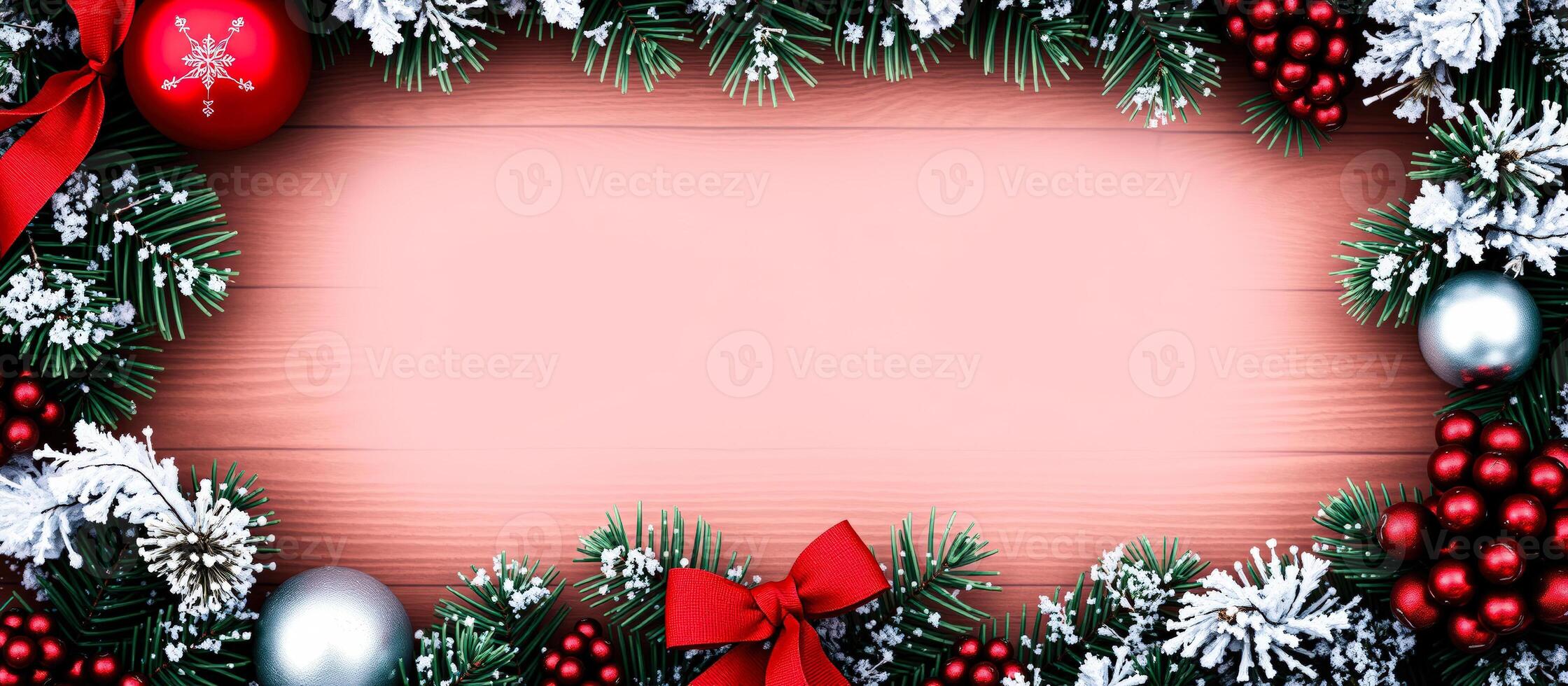 Christmas Background with Pine Branches, Snow, Red Ornaments and a Bow photo