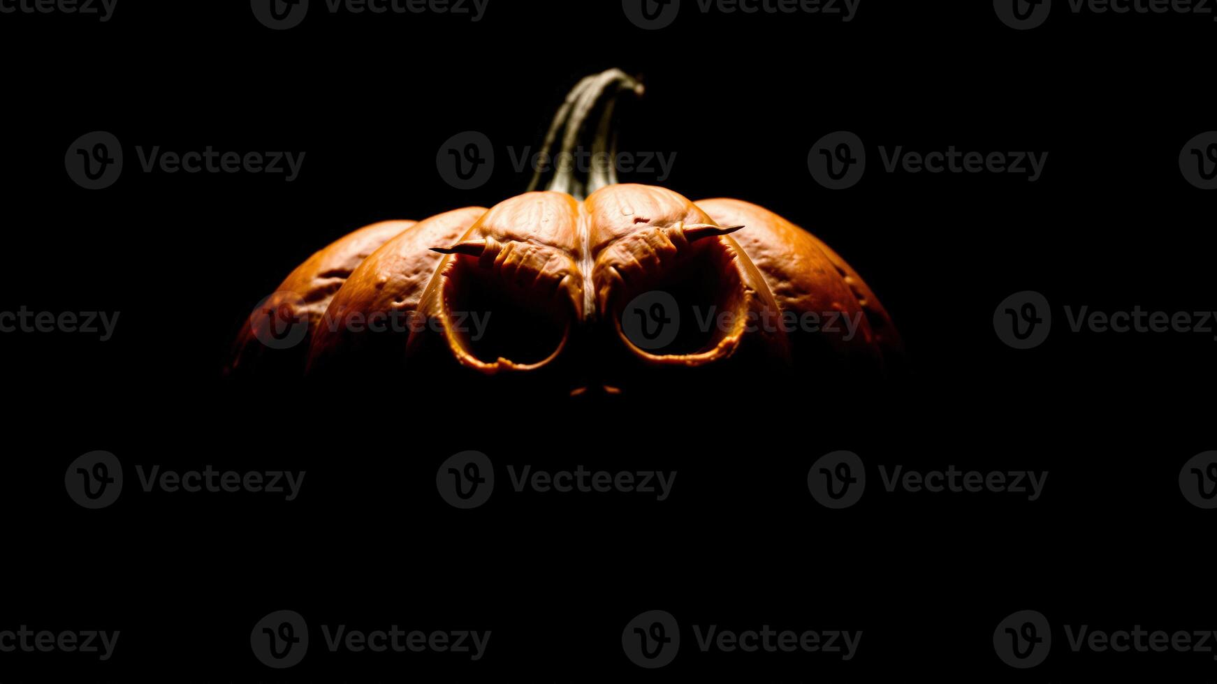 Close up of a scary jack-o-lantern photo