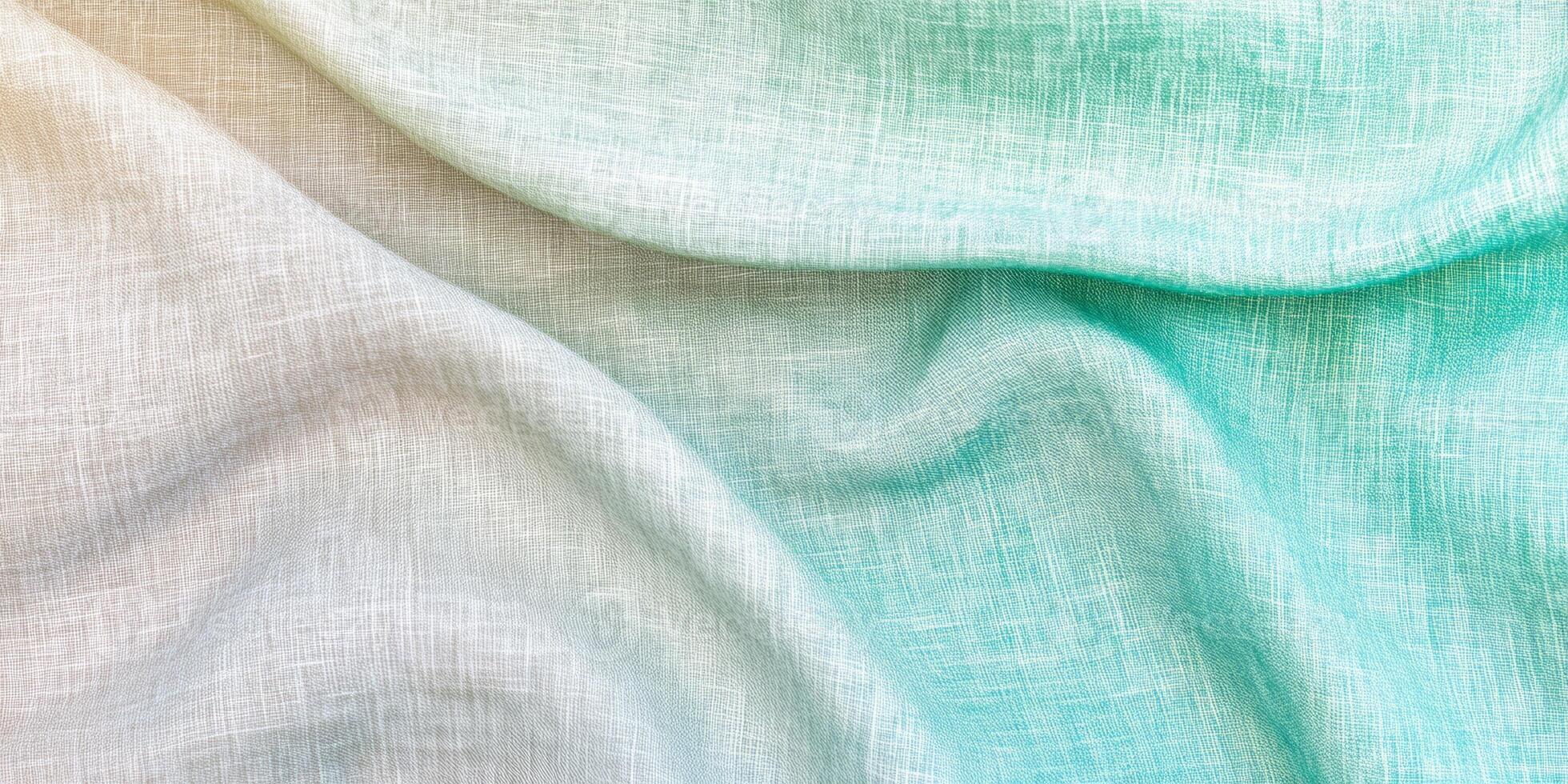 Close-up of soft sage green and gray linen fabric showcasing natural texture and gentle lighting photo