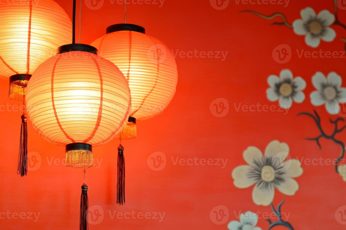 Decorative red lanterns illuminate a vibrant Chinese New Year background with elegant floral motifs and festive spirit photo