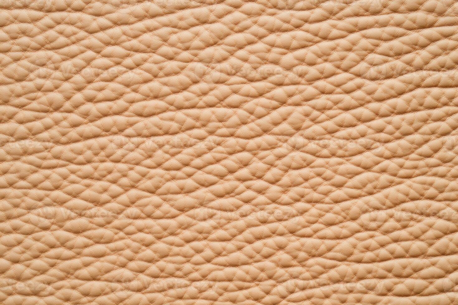 Elegant warm leather surface with soft light showcasing subtle textures in a soothing color palette photo