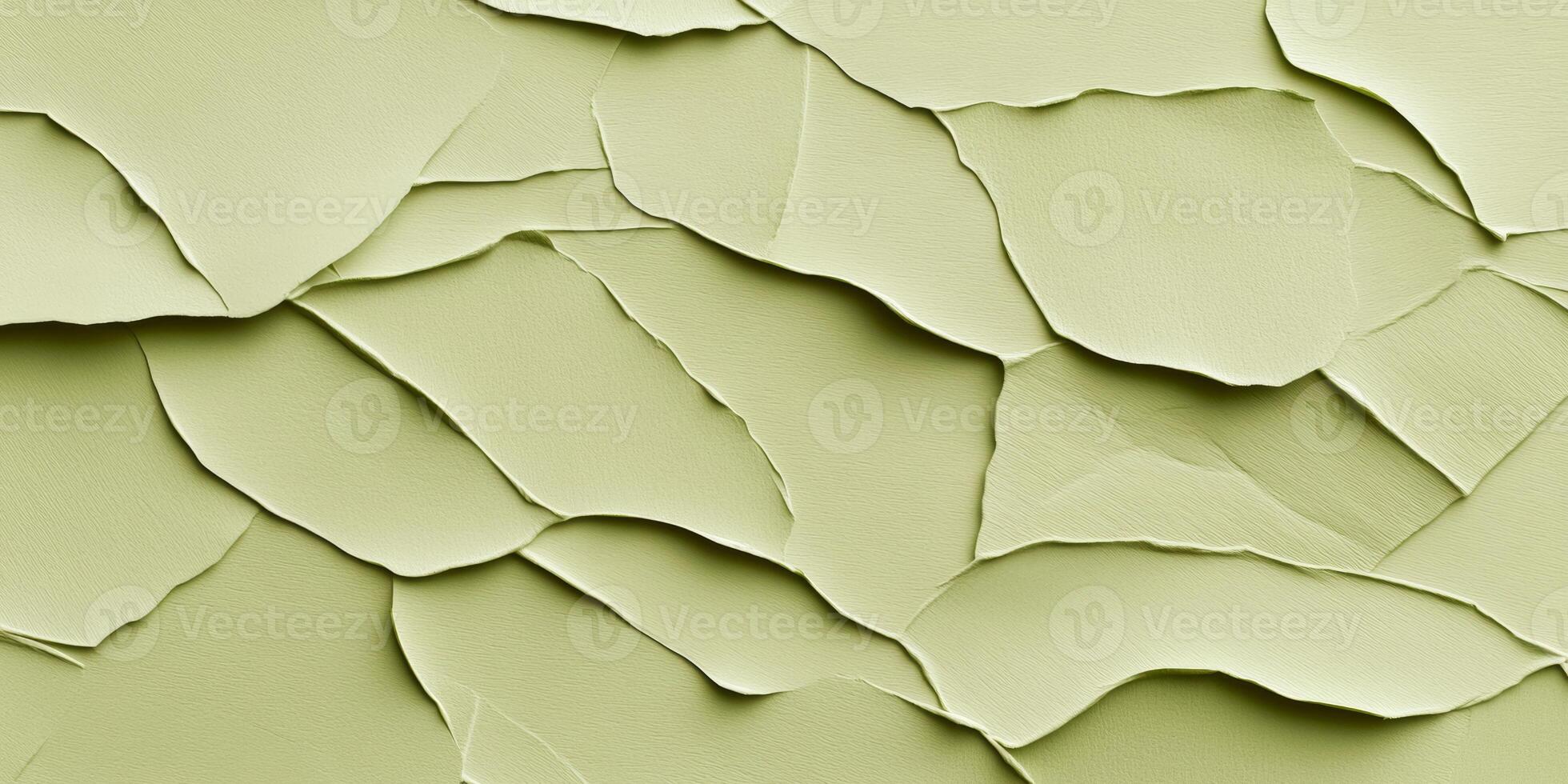 Detailed texture of crumpled light olive-tinted paper with soft folds creating a vintage, natural appearance photo