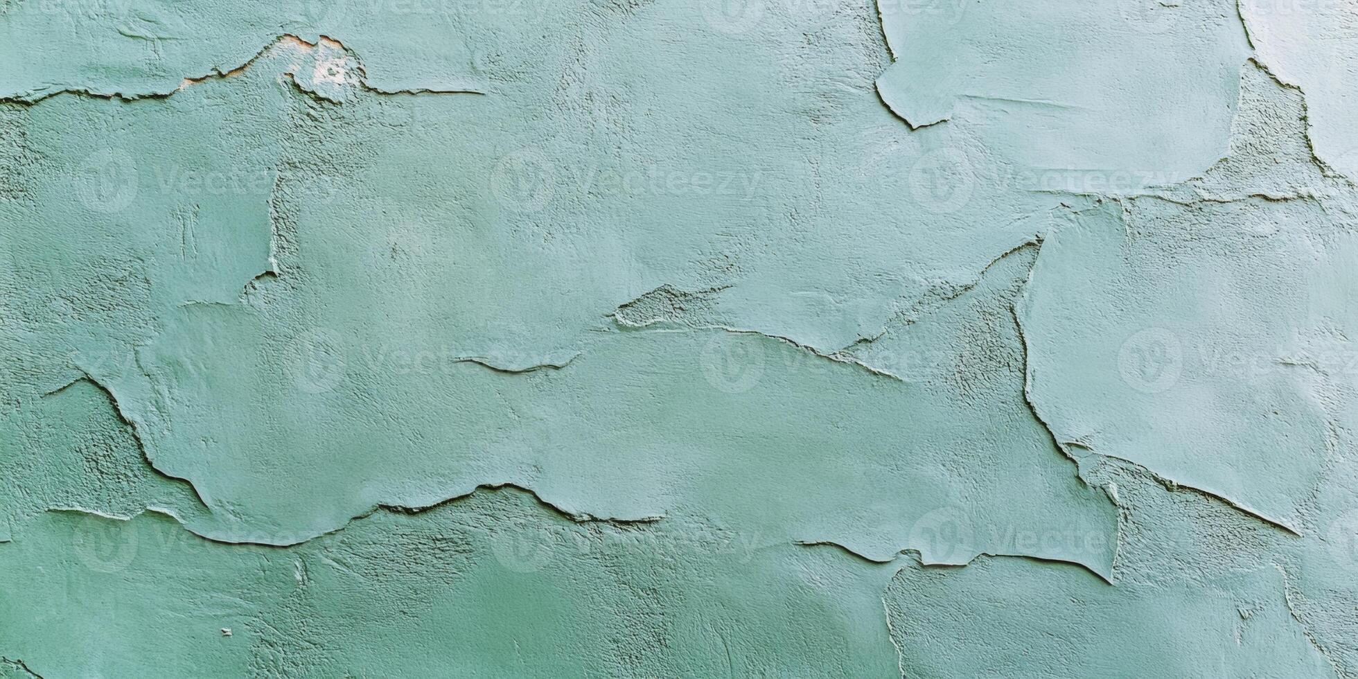 Close-up of a vintage olive-green plaster wall showcasing intricate textures and subtle imperfections photo