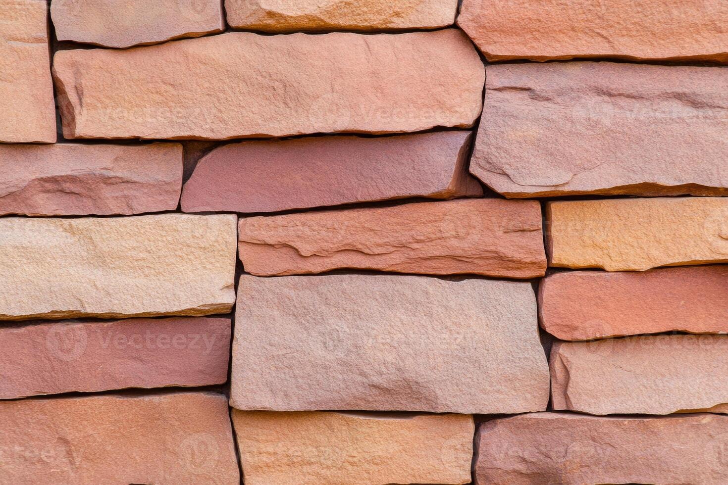 Close-up view of rough red sandstone texture with earthy tones in a Southwestern landscape photo