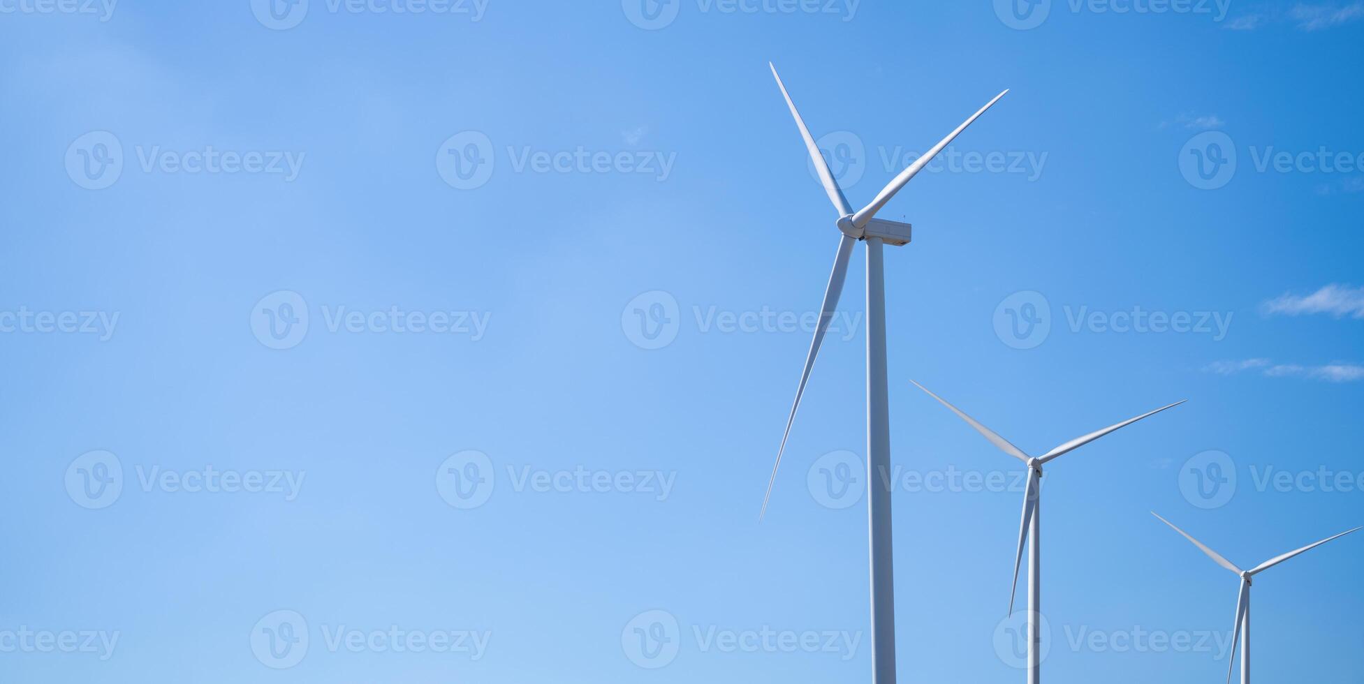 Wind energy and sustainable power generation with wind turbines, Eco-friendly solutions for renewable resources. Wind power farm and sustainable development of renewable energy, green technology. photo