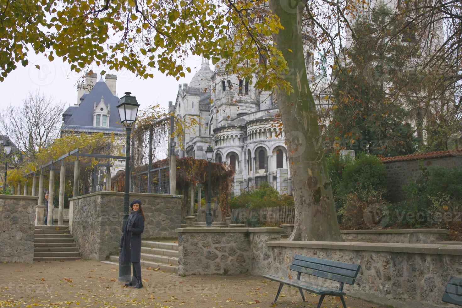 Sacre Coeur Amid Autumn Splendor Golden Leaves and Vibrant Trees Frame Basilica photo