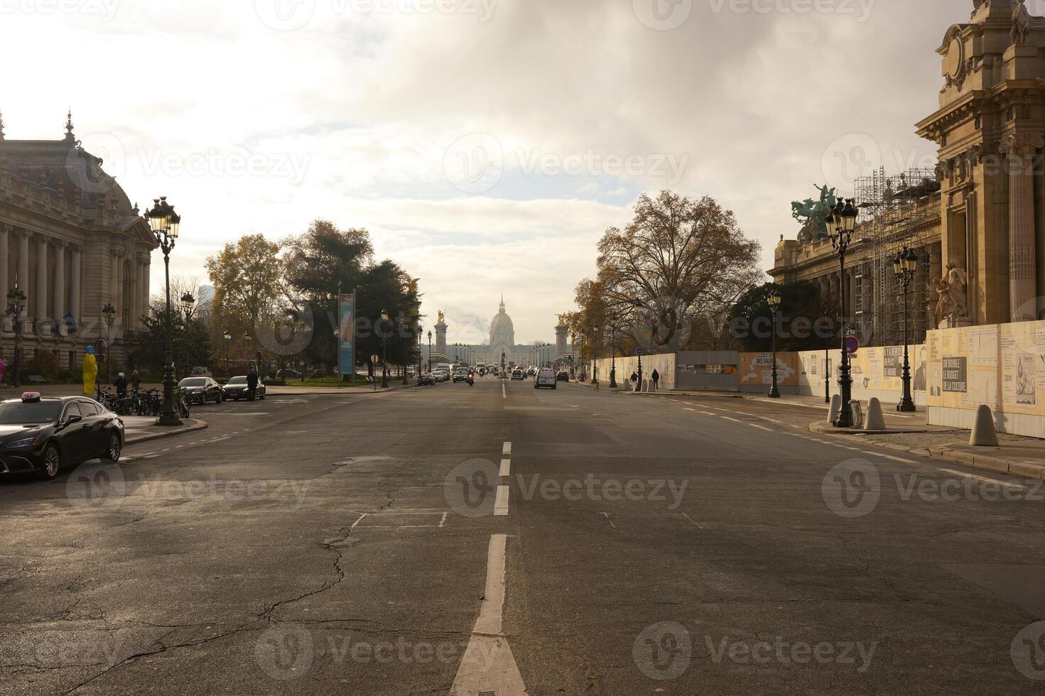 Serene Parisian Scene An Empty Road Showcasing the Majestic Les Invalides photo