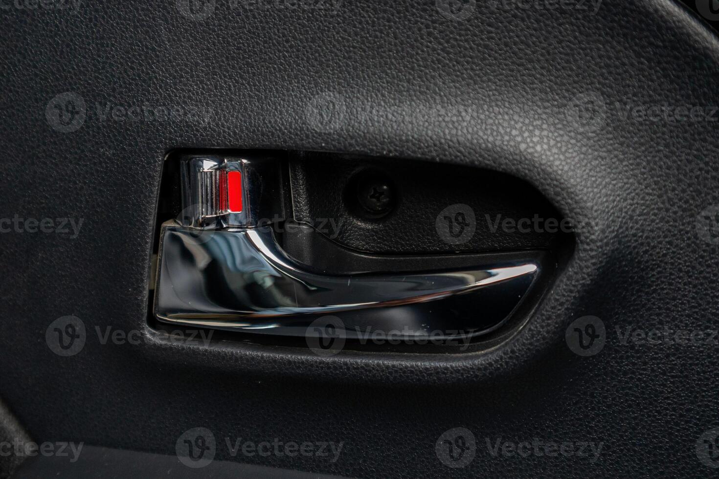 Inside metallic car door handle with open lock photo