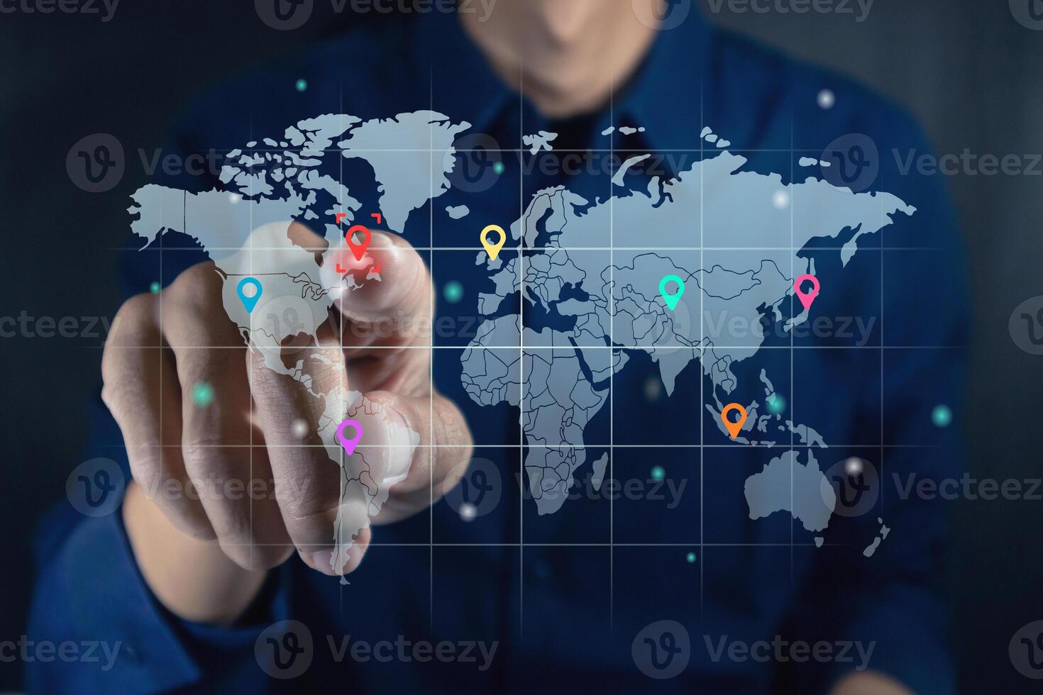 Man touching a virtual screen of world map infographic. World map infographic with color pointers. photo