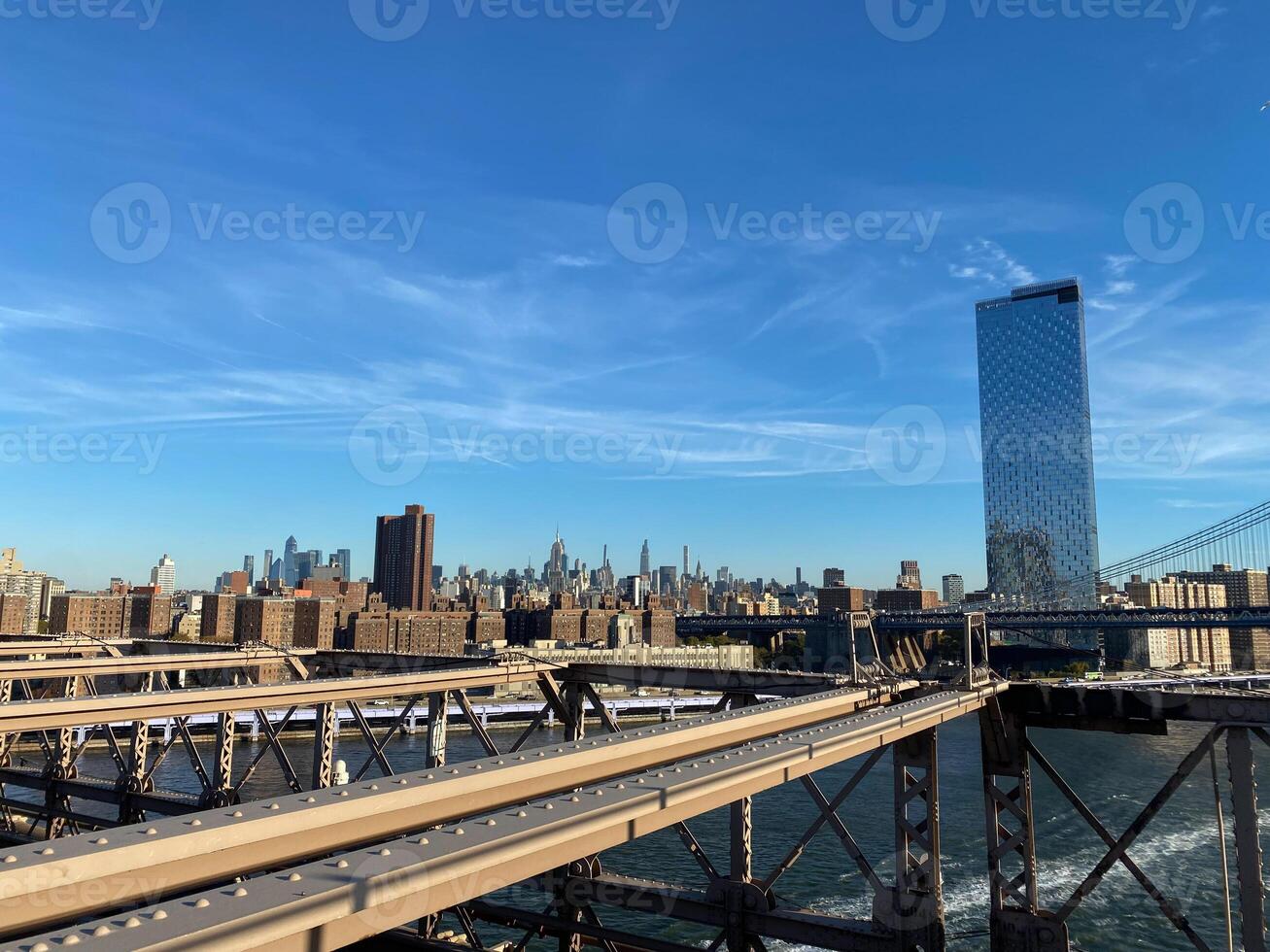 The view from the brooklyn bridge of the city skyline photo