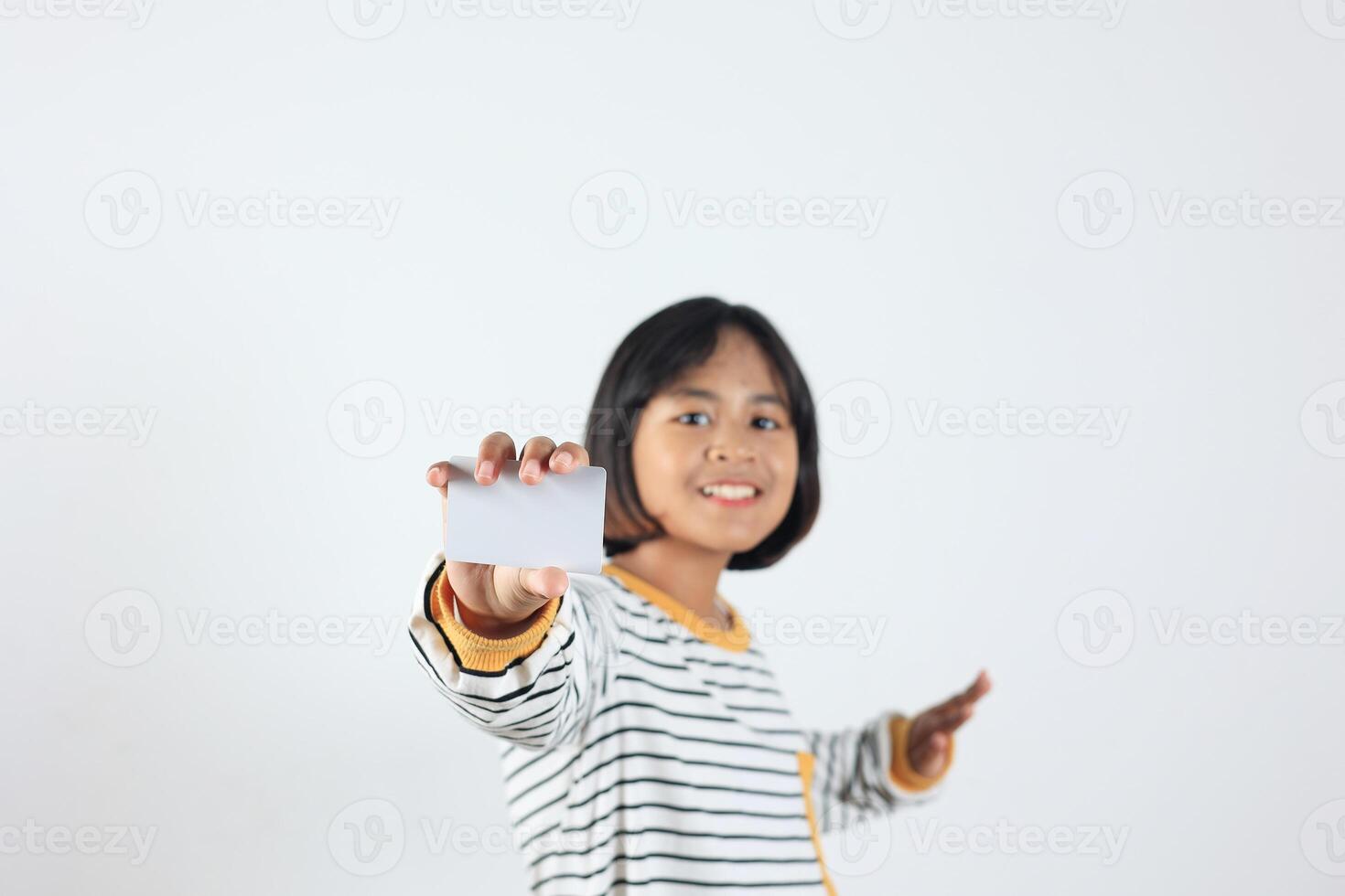 Asian Kids Holding White Empty Bank Card photo