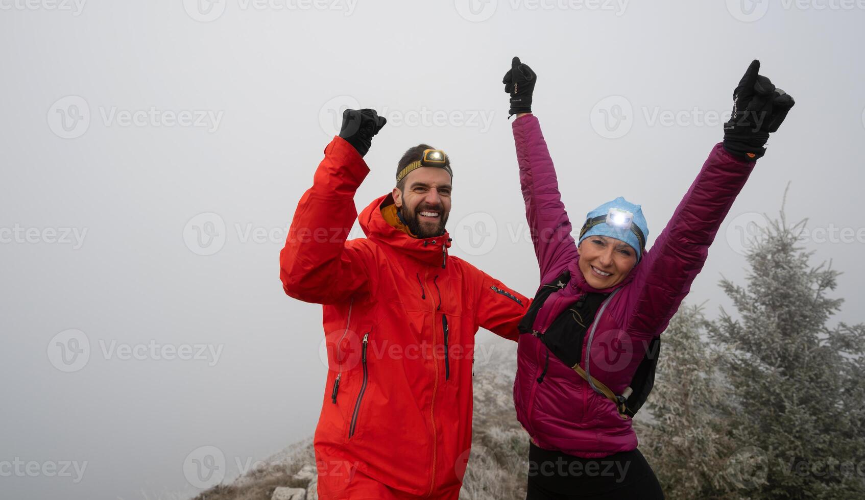 Runner couple having fun after trail cross-country trail running training photo