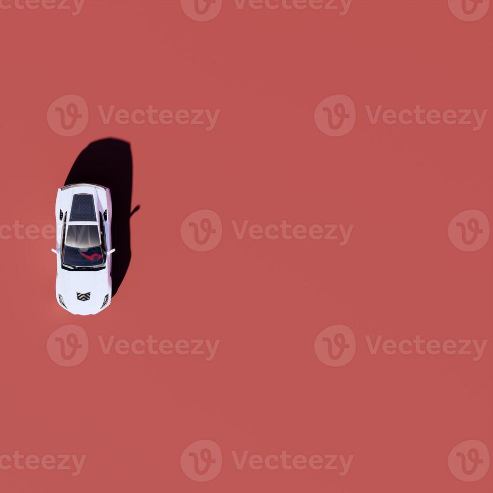 An overhead view of a white car on a red background photo