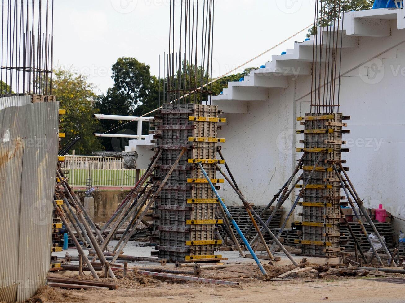 New construction site with beam frame to prepare reinforced concrete columns, foundation work and concrete pouring. Construction industry. photo