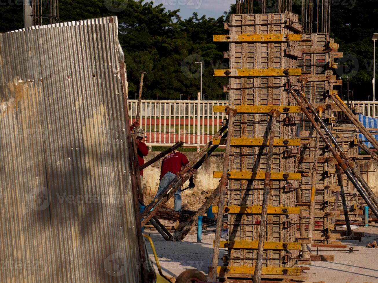 New construction site with beam frame to prepare reinforced concrete columns, foundation work and concrete pouring. Construction industry. photo