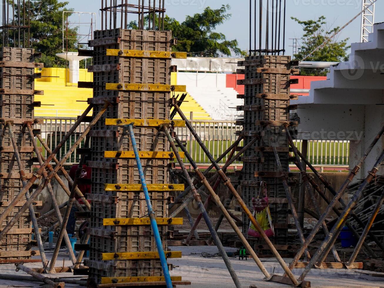 New construction site with beam frame to prepare reinforced concrete columns, foundation work and concrete pouring. Construction industry. photo