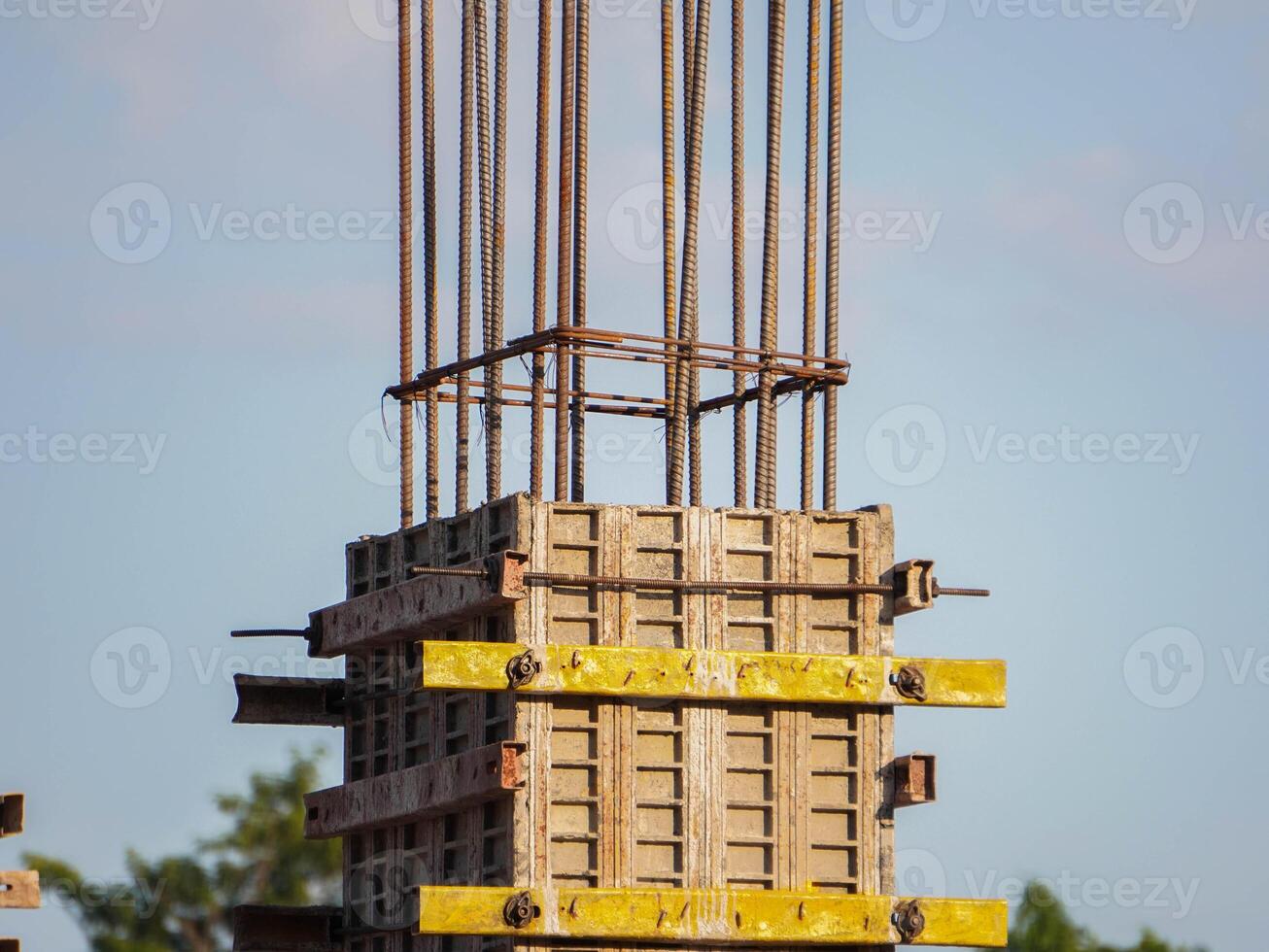 New construction site with beam frame to prepare reinforced concrete columns, foundation work and concrete pouring. Construction industry. photo