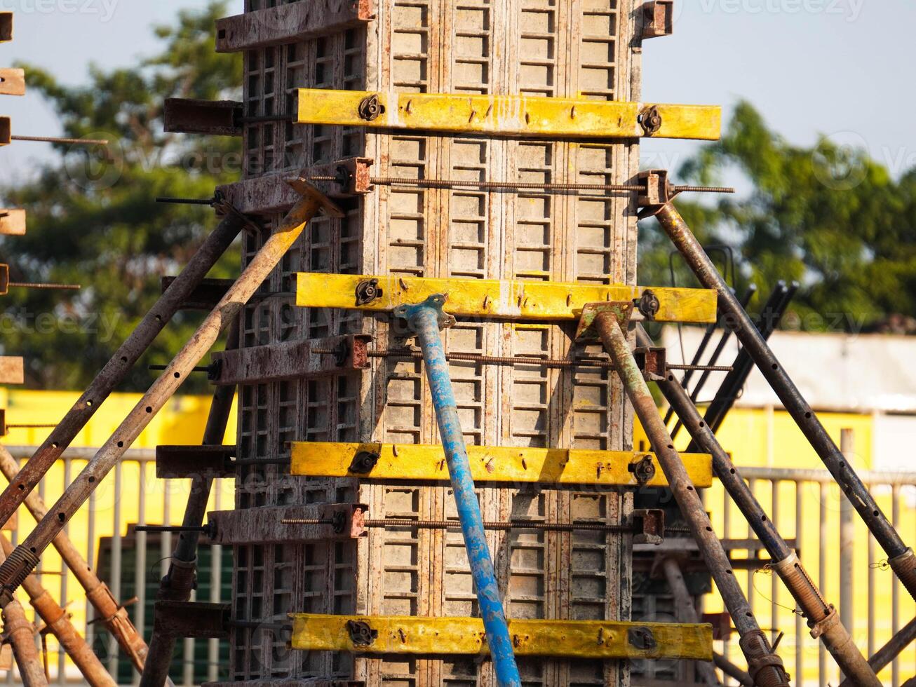 New construction site with beam frame to prepare reinforced concrete columns, foundation work and concrete pouring. Construction industry. photo