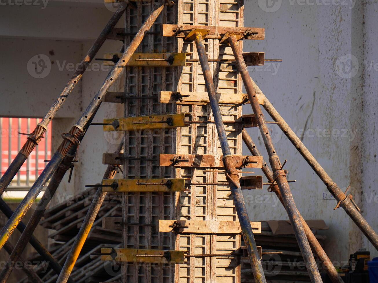 New construction site with beam frame to prepare reinforced concrete columns, foundation work and concrete pouring. Construction industry. photo