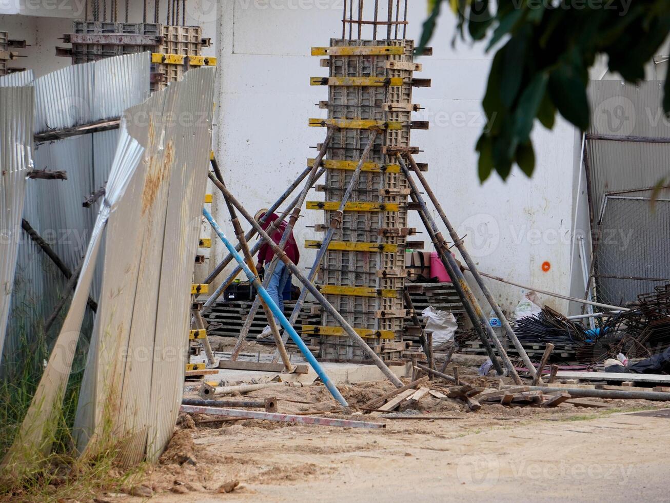New construction site with beam frame to prepare reinforced concrete columns, foundation work and concrete pouring. Construction industry. photo