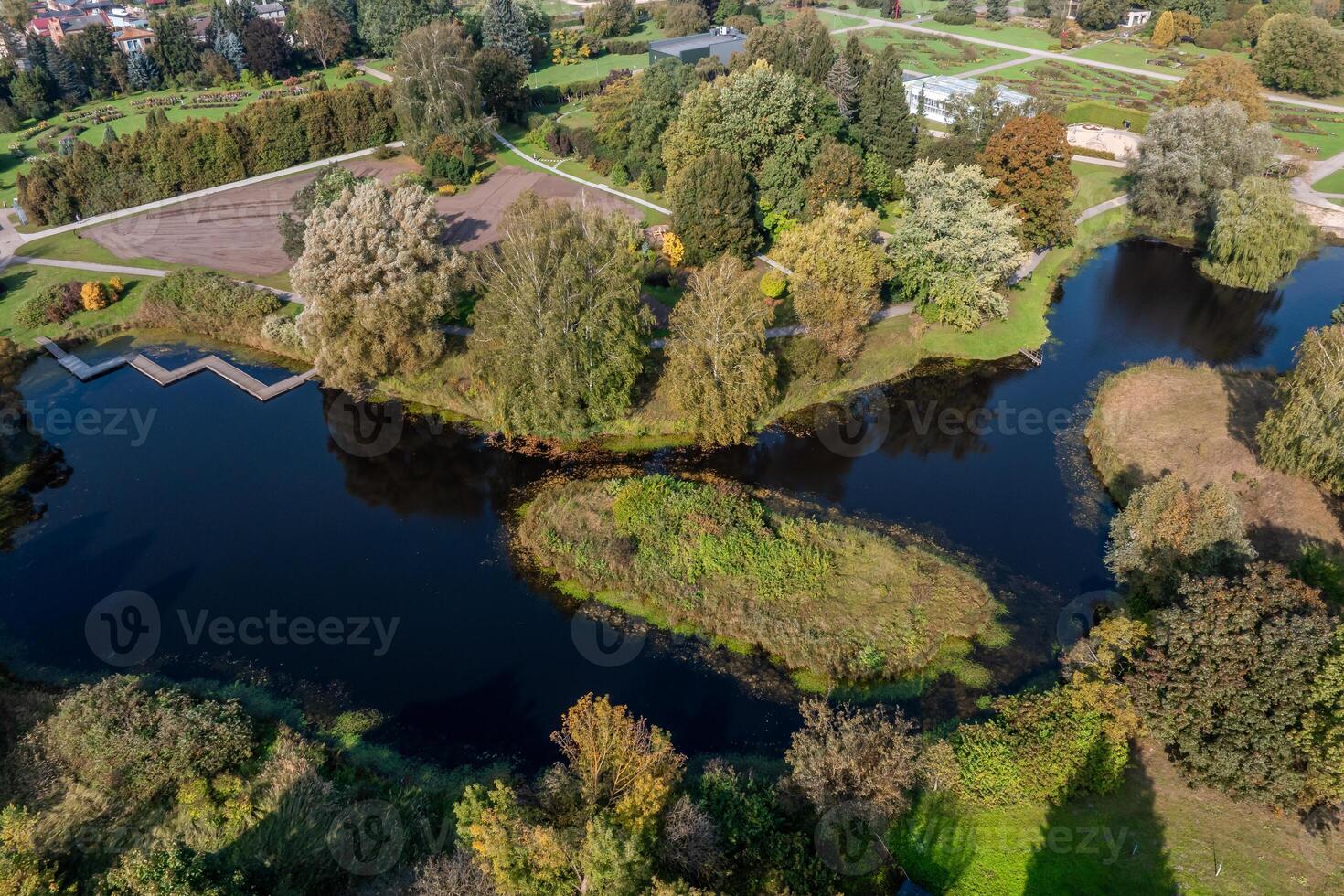 Aerial View of Botanical Garden with Zigzag Waterway and Greenery photo