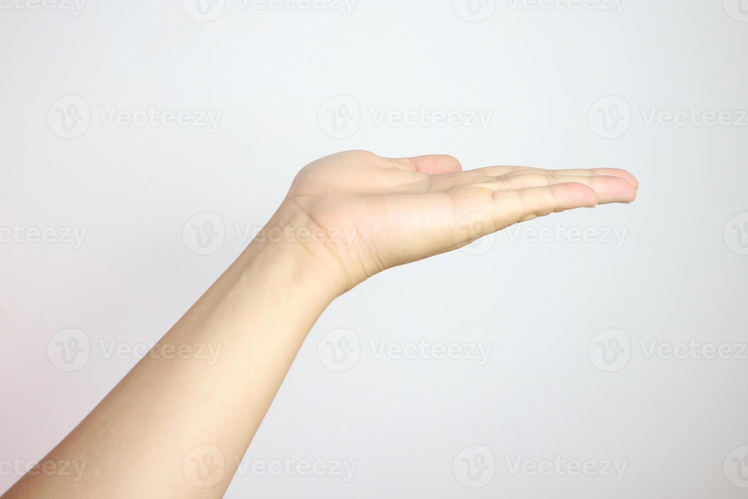 Hand palm open stretching reach outstretched. Empty give hold white gesture isolated. Help background, male body person people human concept. Man mature expressing expression photo