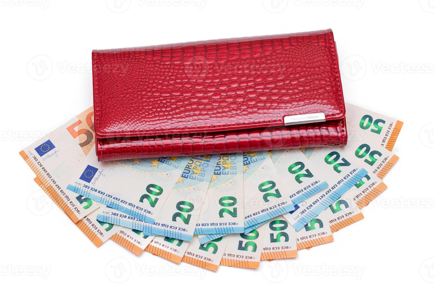 Red Leather Women Purse with Different Euro Banknotes - Isolated on White Background. A Wallet Full of European Union Paper Money Symbolizing Wealth, Success and Social Status - Isolation photo
