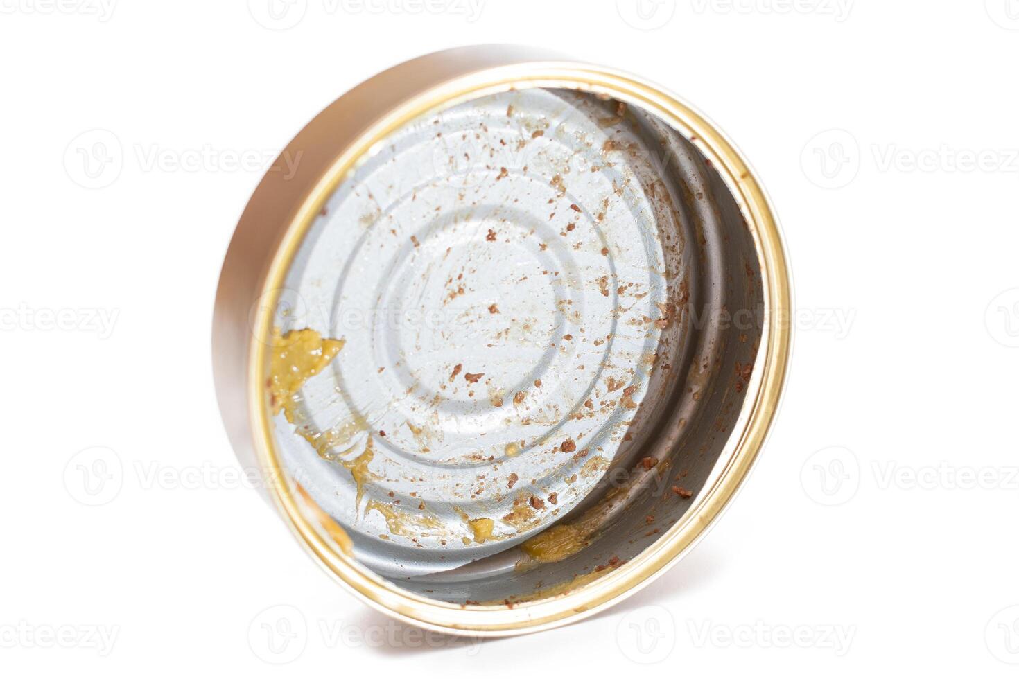 Opened Empty Tin Can Isolated on White Background. Dirty Used Aluminum Can - Isolation. Non-Degradable Inorganic Waste photo