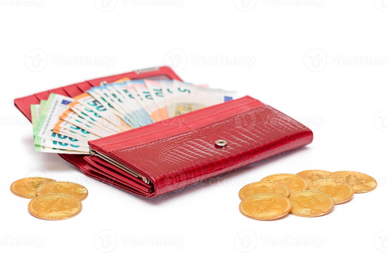 Red Leather Women Purse with Different Euro Banknotes and Bitcoin Coins - Isolated on White Background. A Wallet Full of European Union Paper Money Symbolizing Wealth and Success - Isolation photo