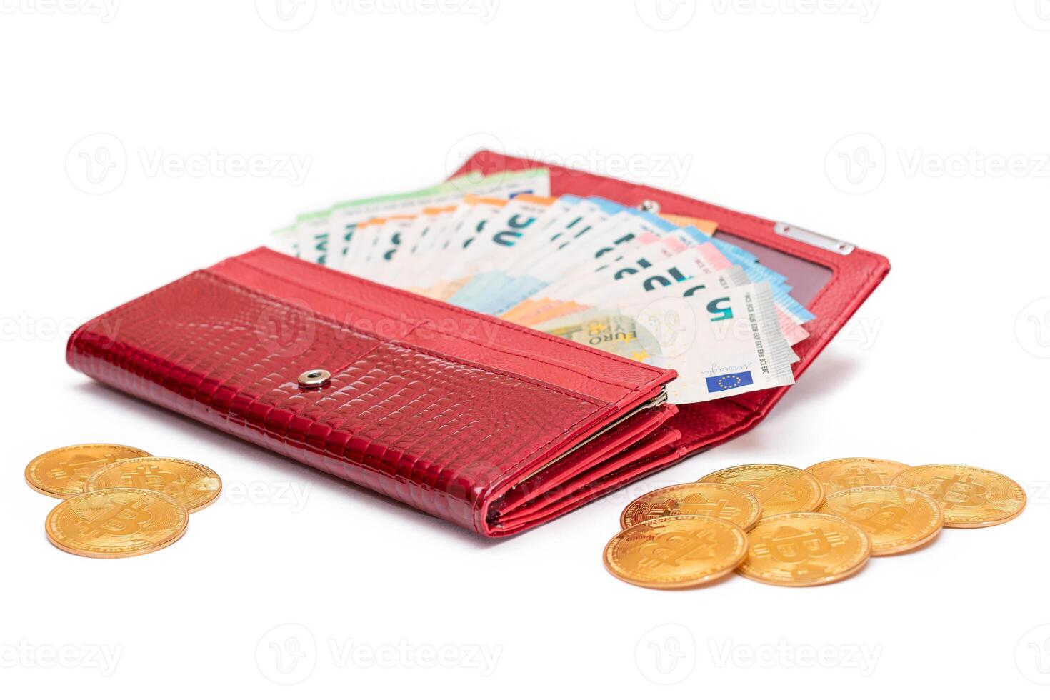 Red Leather Women Purse with Different Euro Banknotes and Bitcoin Coins - Isolated on White Background. A Wallet Full of European Union Paper Money Symbolizing Wealth and Success - Isolation photo