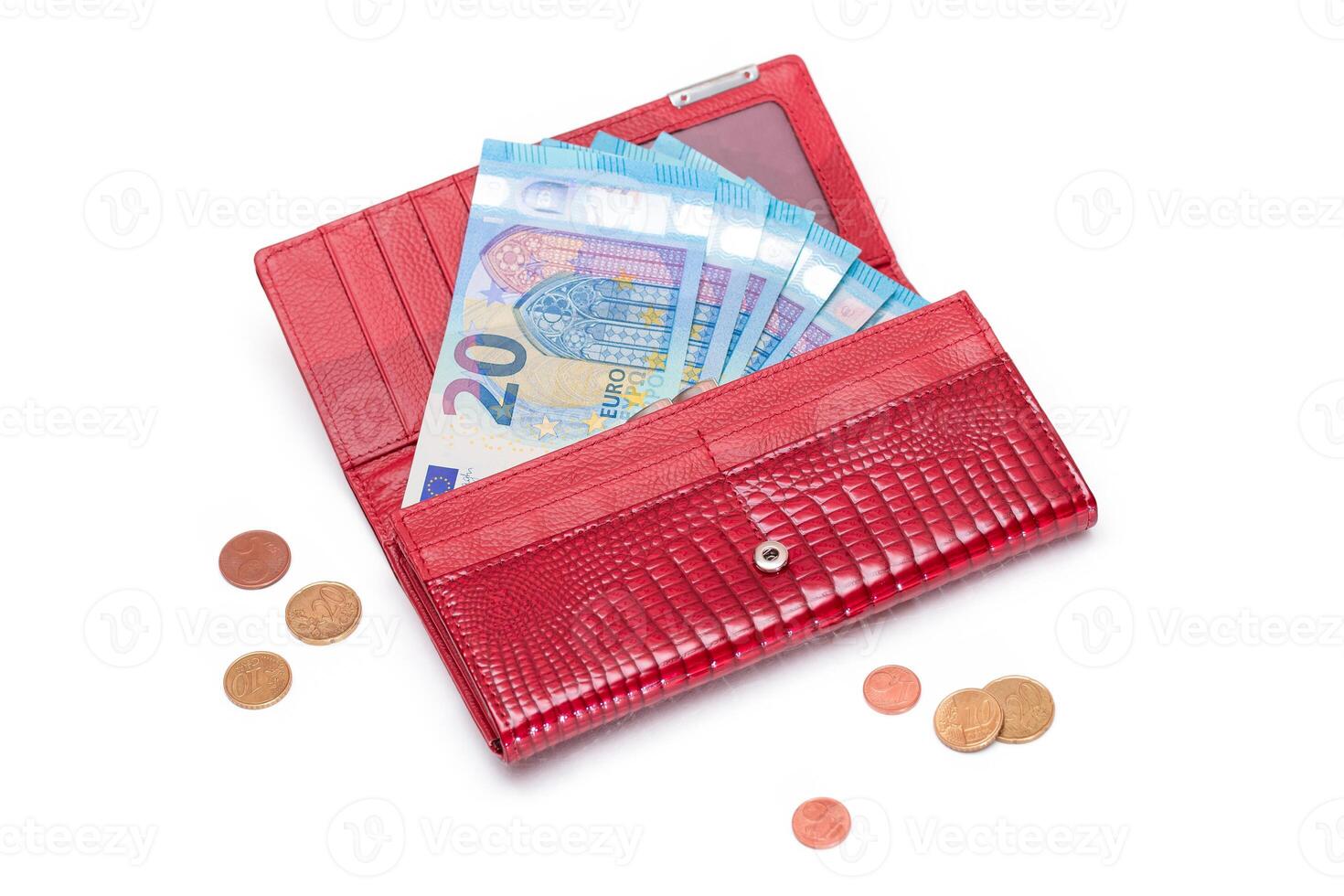 Opened Red Women Purse with 20 Euro Banknotes Inside and Scattered Euro Cent Coins - Isolated on White Background. A Wallet Full of Money Symbolizing Wealth, Success, Shopping and Social Status - Isolation photo