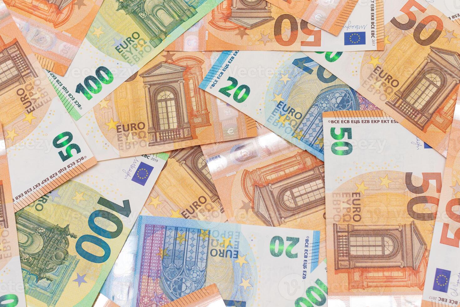 Different Euro Banknotes Money Background. Euro Money Currency. Colored Paper Money. A Lot of Fifty Euro Bills. Business, Finances, Cash and Money Saving Concept photo