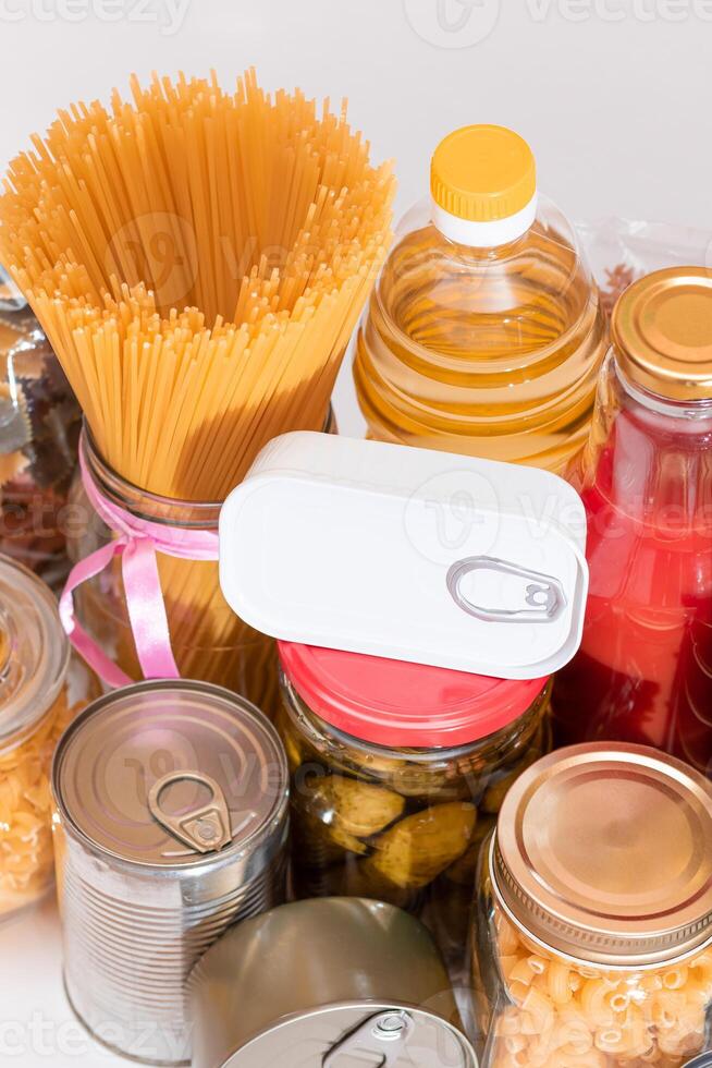 Food Reserves. Canned Food, Spaghetti, Pate, Tuna, Tomato Juice, Pasta, Fish and Grocery. Emergency Food Storage in Case of Crisis. Strategic Food Supplies photo