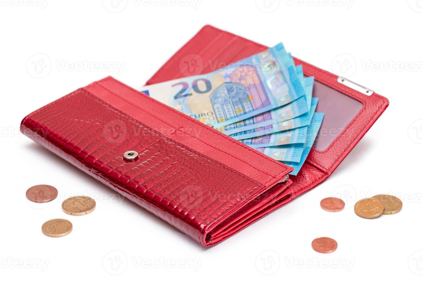 Opened Red Women Purse with 20 Euro Banknotes Inside and Scattered Euro Cent Coins - Isolated on White Background. A Wallet Full of Money Symbolizing Wealth, Success, Shopping and Social Status - Isolation photo