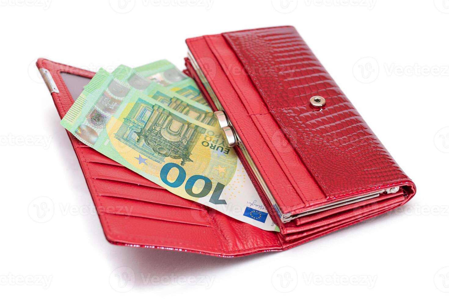 Opened Red Leather Women Purse with One Hundred Euro Banknotes Inside - Isolated on White Background. A Wallet Full of Money Symbolizing Wealth, Success, Shopping and Social Status - Isolation photo