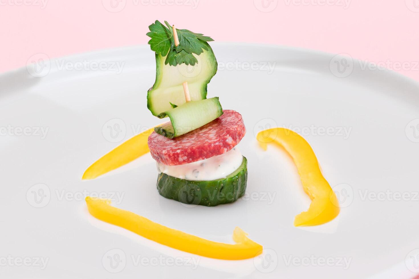 Canapes without Bread with Salami, Cucumber, Greens and Cream Cheese on White Plate. Easy Breakfast. Diet Food. Quick and Healthy Sandwiches. Healthy Snacks with Tasty Fillings photo