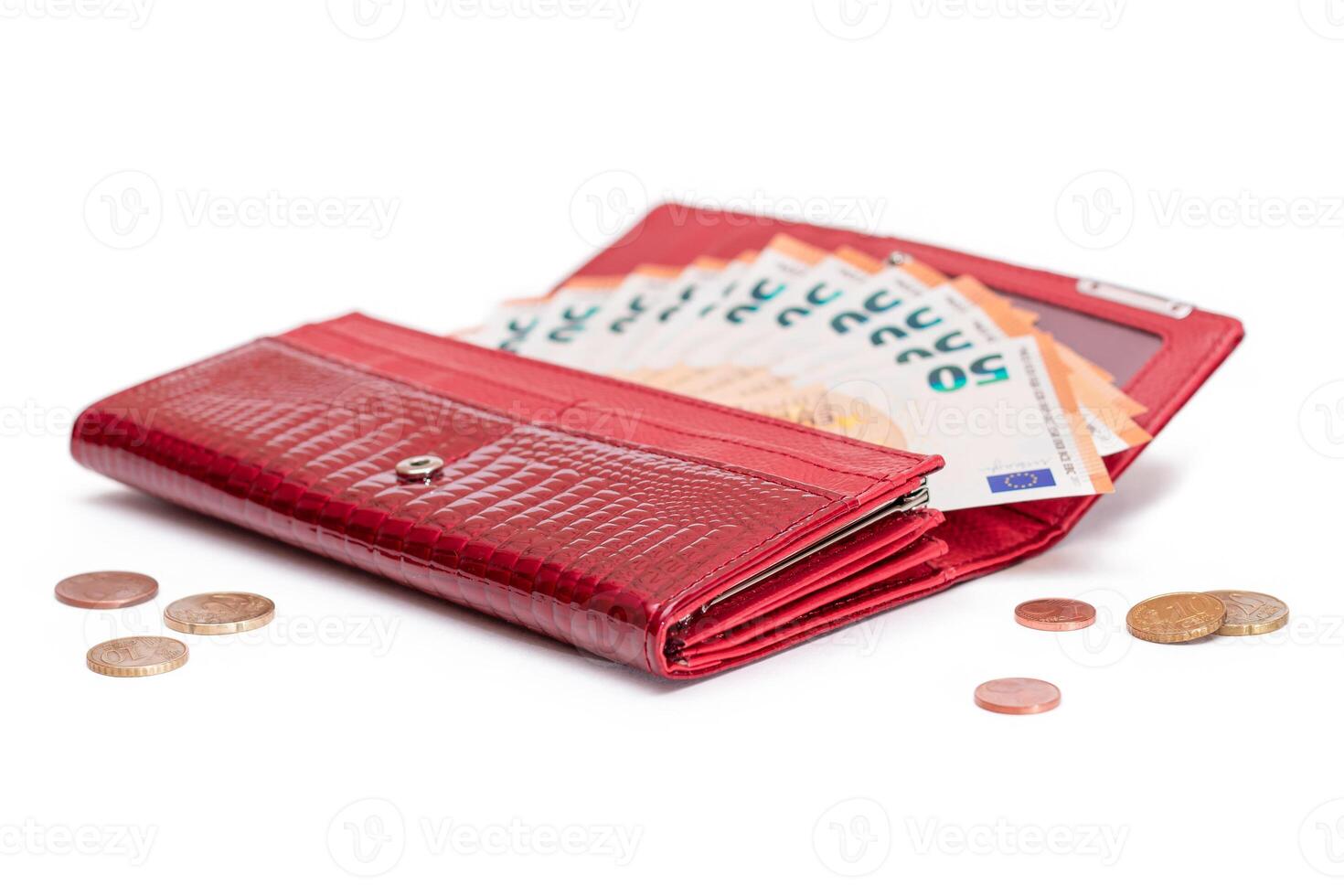 Opened Red Women Purse with 50 Euro Banknotes Inside and Scattered Euro Cent Coins - Isolated on White Background. A Wallet Full of Money Symbolizing Wealth, Success, Shopping and Social Status - Isolation photo