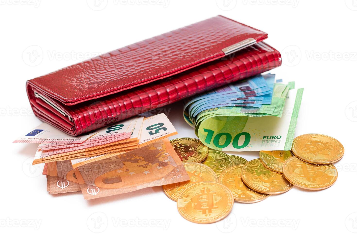 Red Leather Women Purse with Different Euro Banknotes and Bitcoin Coins - Isolated on White Background. A Wallet Full of European Union Paper Money Symbolizing Wealth and Success - Isolation photo