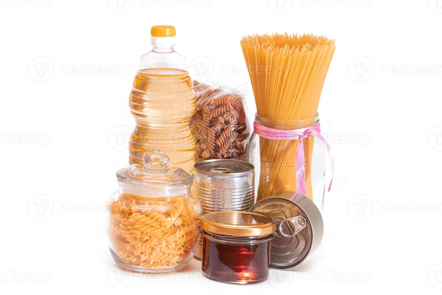 Food Reserves. Canned Food, Spaghetti, Pate, Tuna, Tomato Juice, Pasta, Fish and Grocery - Isolated on White Background. Emergency Food Storage in Case of Crisis. Strategic Food Supplies - Isolation photo
