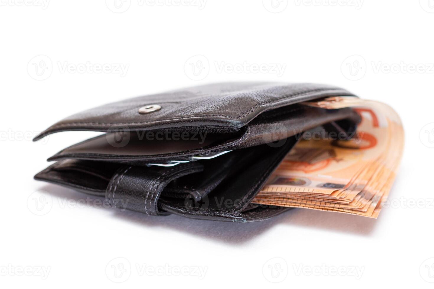 Black Leather Men Wallet with Fifty Euro Banknotes Inside - Isolated on White Background. A Purse Full of Money Symbolizing Wealth, Success and Social Status - Isolation photo