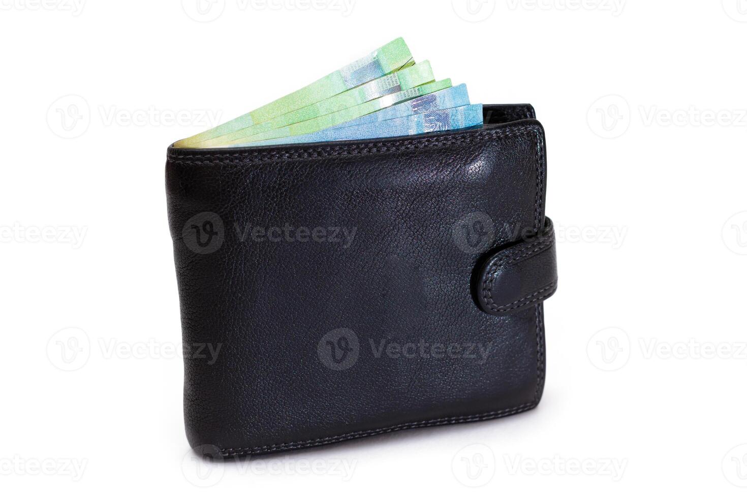 Black Leather Men Wallet with Euro Banknotes Inside - Isolated on White Background. A Purse Full of Money Symbolizing Wealth, Success and Social Status - Isolation photo