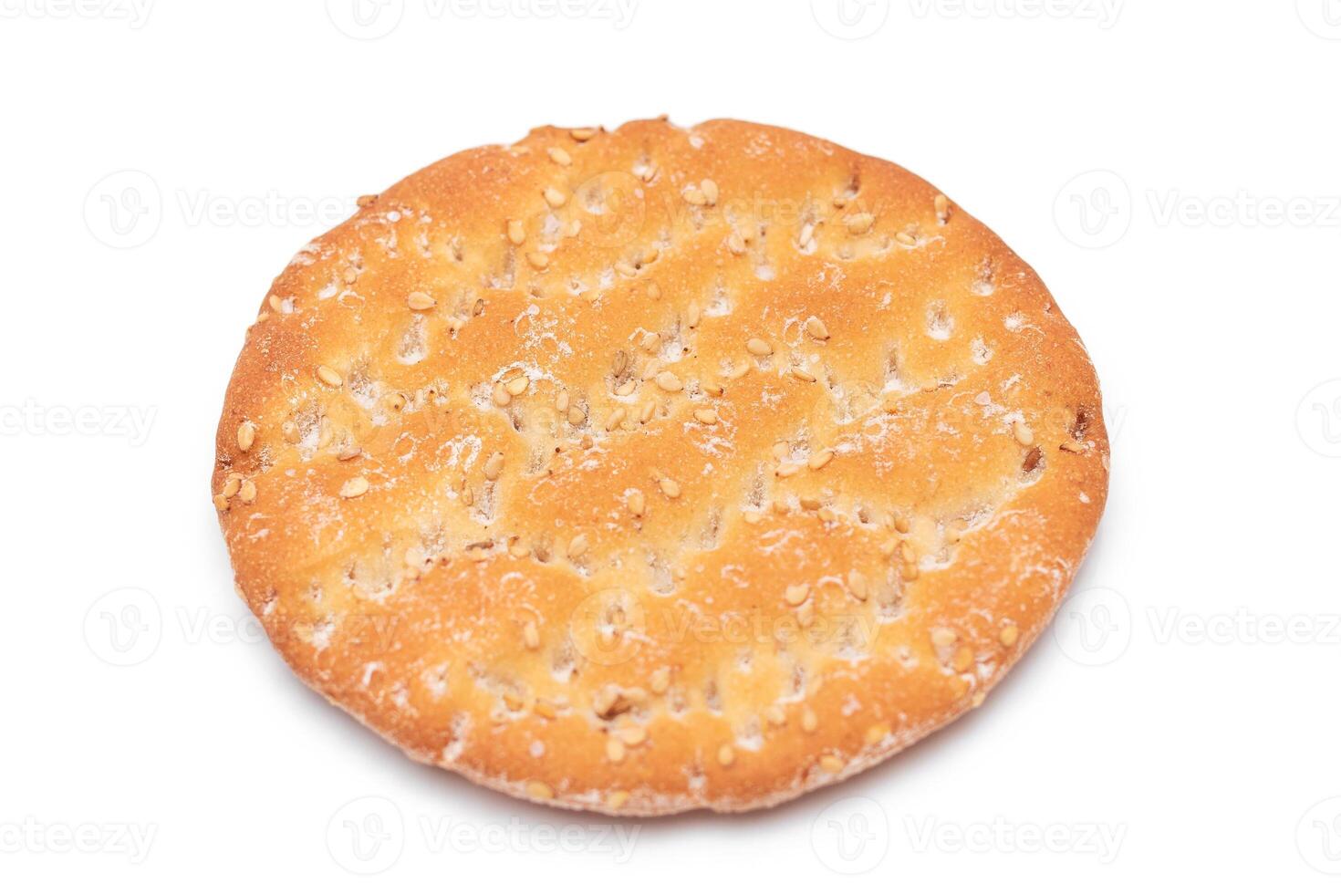 Round Salt Cracker with Sesame Isolated on White Background. Dry Snack - Isolation photo