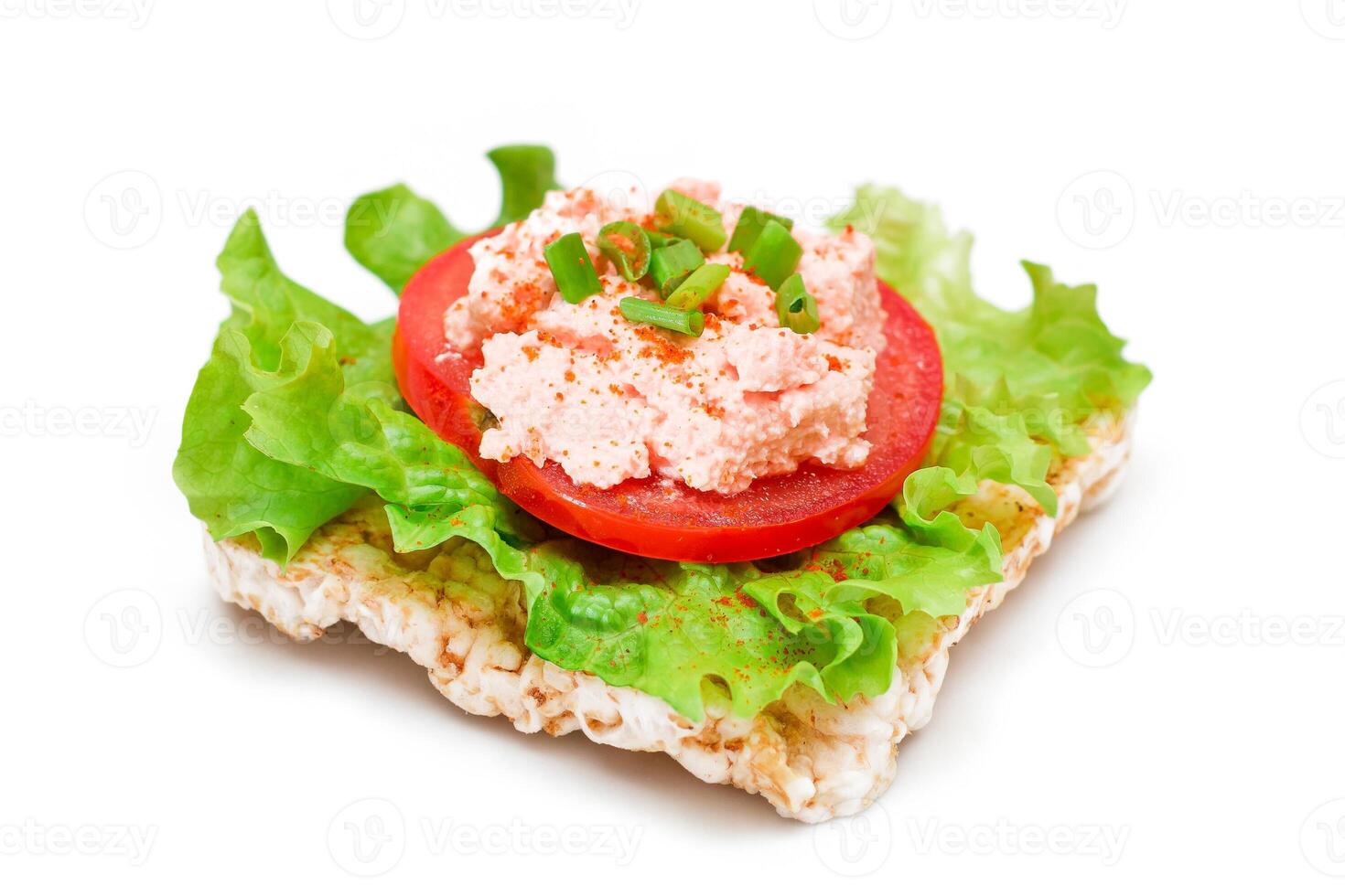 Rice Cake Sandwich with Tomato, Lettuce, Fish Cream and Green Onions - Isolated on White. Easy Breakfast. Diet Food. Quick and Healthy Sandwiches. Crispbread with Tasty Filling - Isolation photo