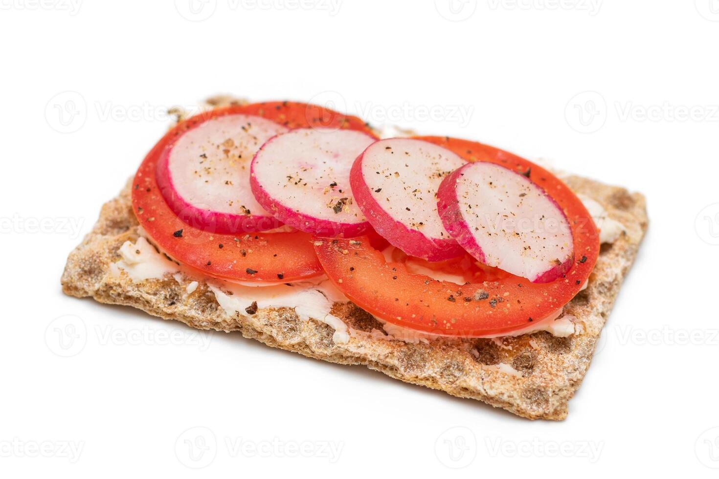 Whole Grain Crispbread with Tomato, Cream Cheese and Radish - Isolated on White. Easy Breakfast. Quick and Healthy Sandwiches. Crispbread with Tasty Filling. Healthy Dietary Snack - Isolation photo