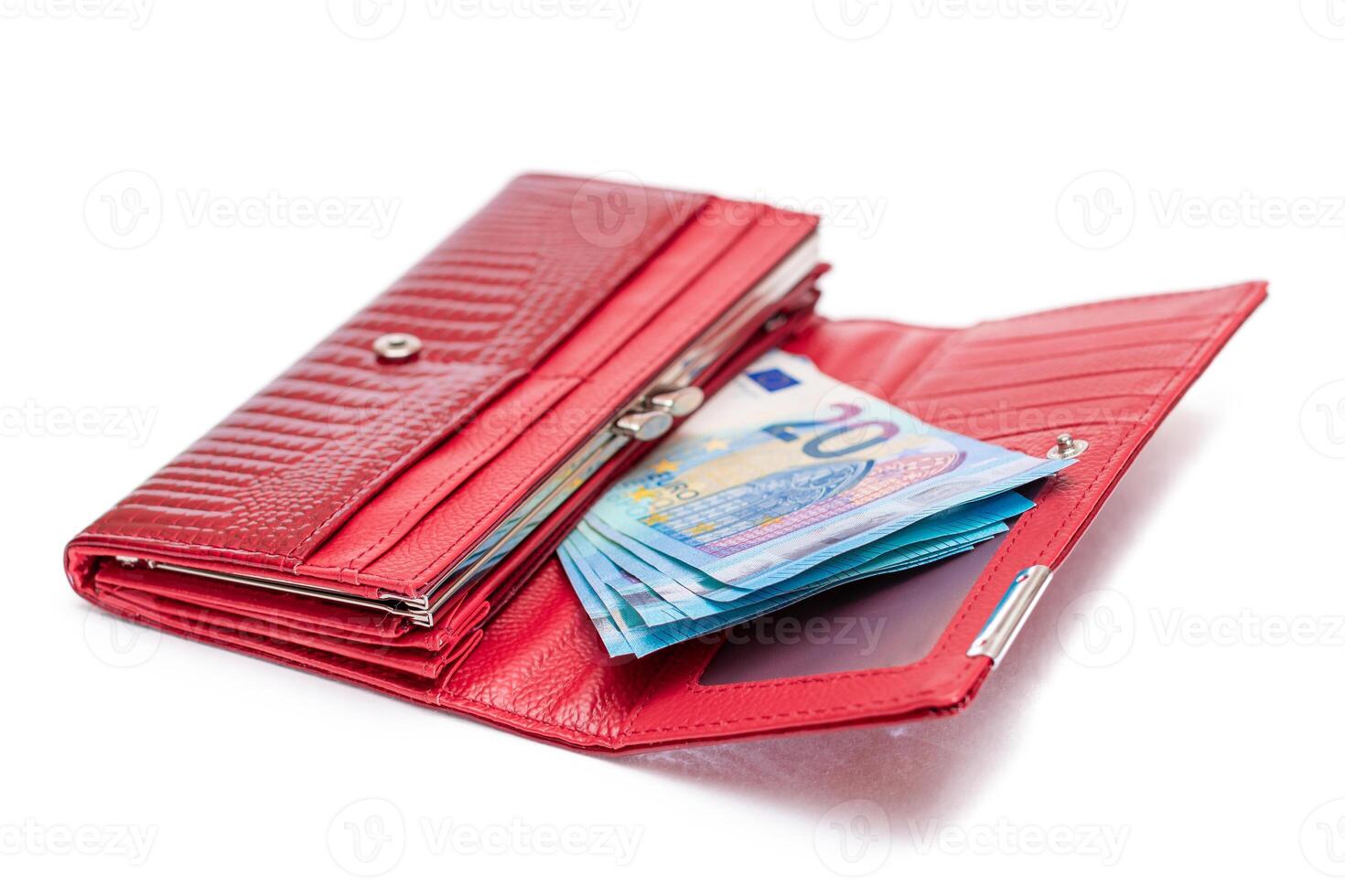 Opened Red Women Purse with 20 Euro Banknotes Inside - Isolated on White Background. A Wallet Full of Money Symbolizing Wealth, Success, Shopping and Social Status - Isolation photo